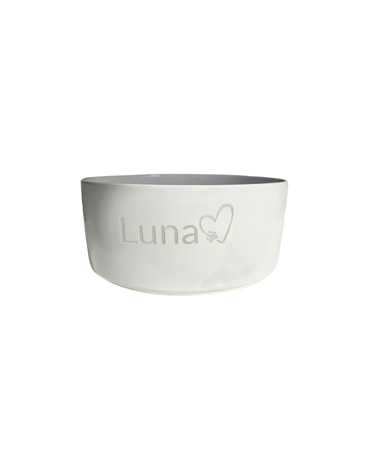 White pet bowl with 'Luna' and a heart design on a white background