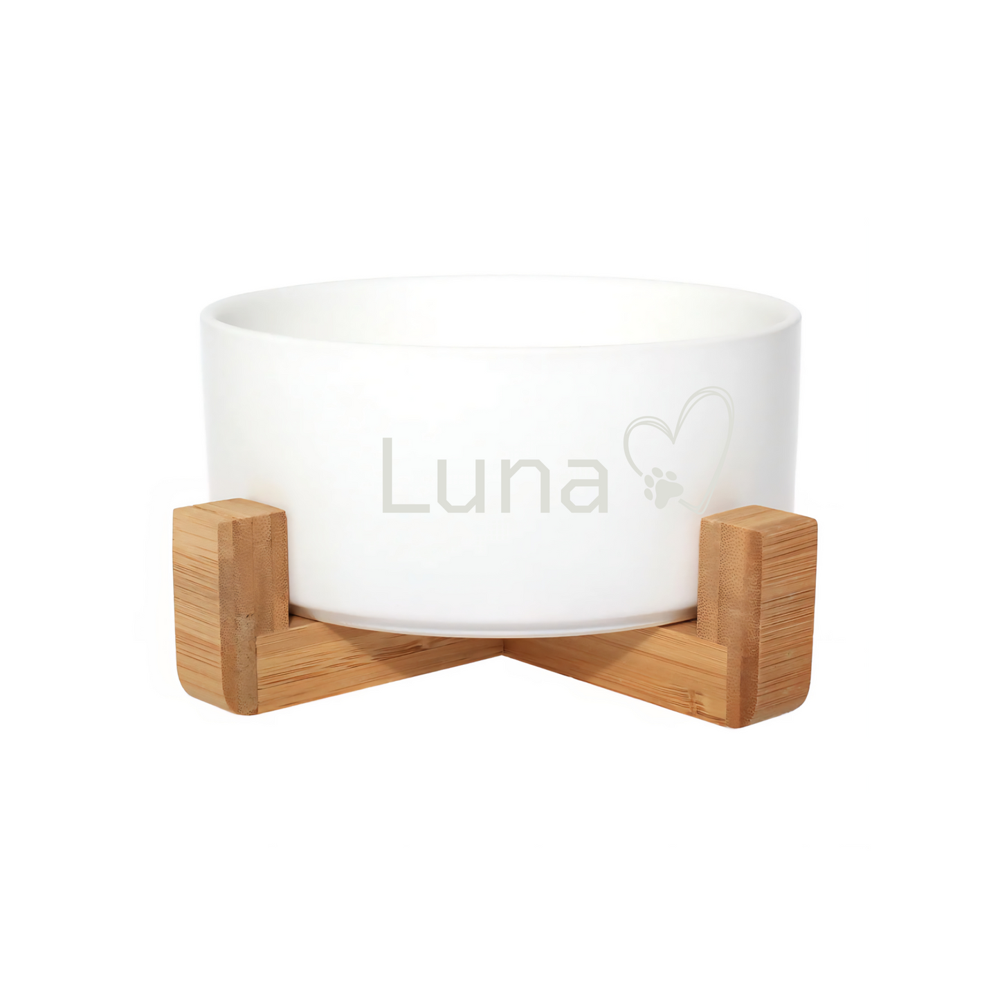 personalised white dog bowl in a bamboo holder with luna engraved on the front