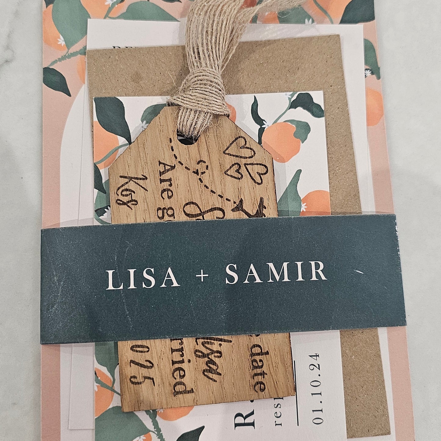wedding invitation set with lisa and samir written on the front