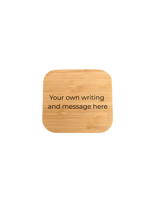 Wooden wireless charger  with space for personal text on a white background