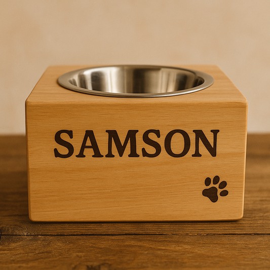 personalised wooden pet bowl stand with 'SAMSON' engraved, on a wooden surface.