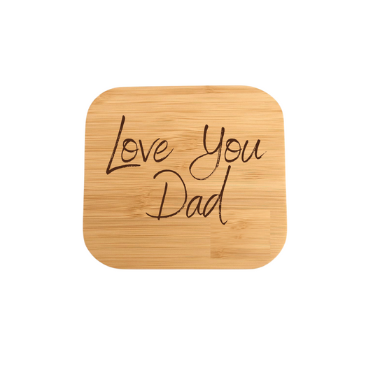 Bamboo wireless charger  with 'Love You Dad' text on a white background