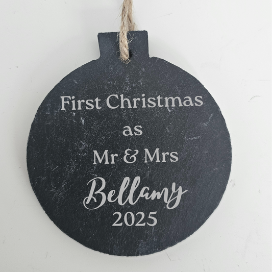 Decorative ornament with 'First Christmas as Mr & Mrs Bellamy 2025' text on a white background
