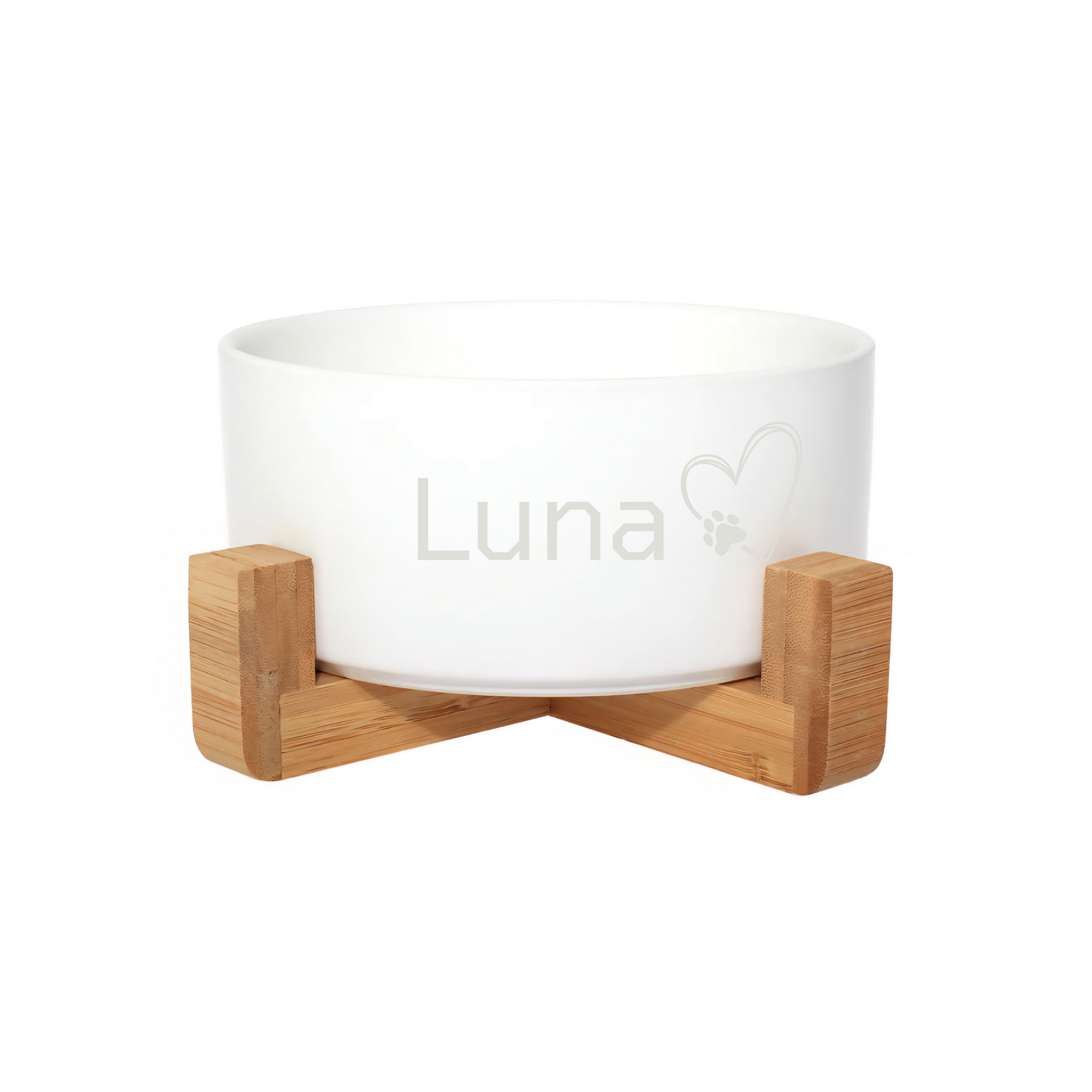 personalised white dog bowl in a bamboo holder with luna engraved on the front