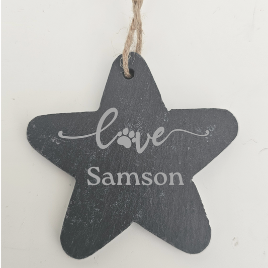 Star-shaped chalkboard tag with 'love Samson' text on a white background